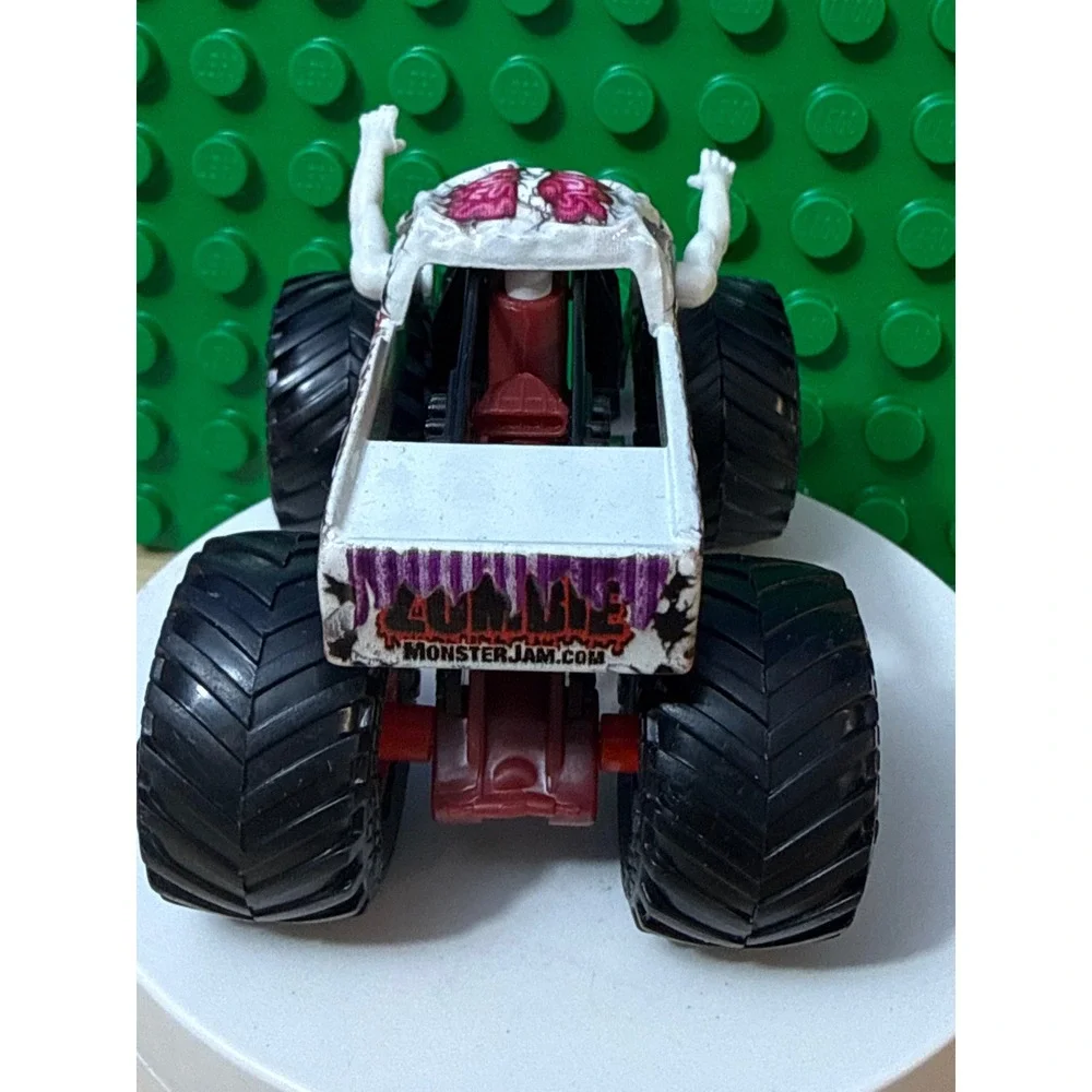 Monster Jam Zombie Monster Truck 1:64 Scale Die-Cast White Red Chassis BKT Tires